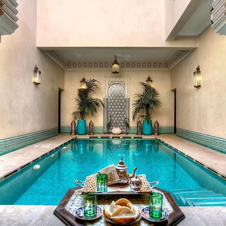 Riad Kniza Марракеш Бассейн фото The swimming pool at the hotel