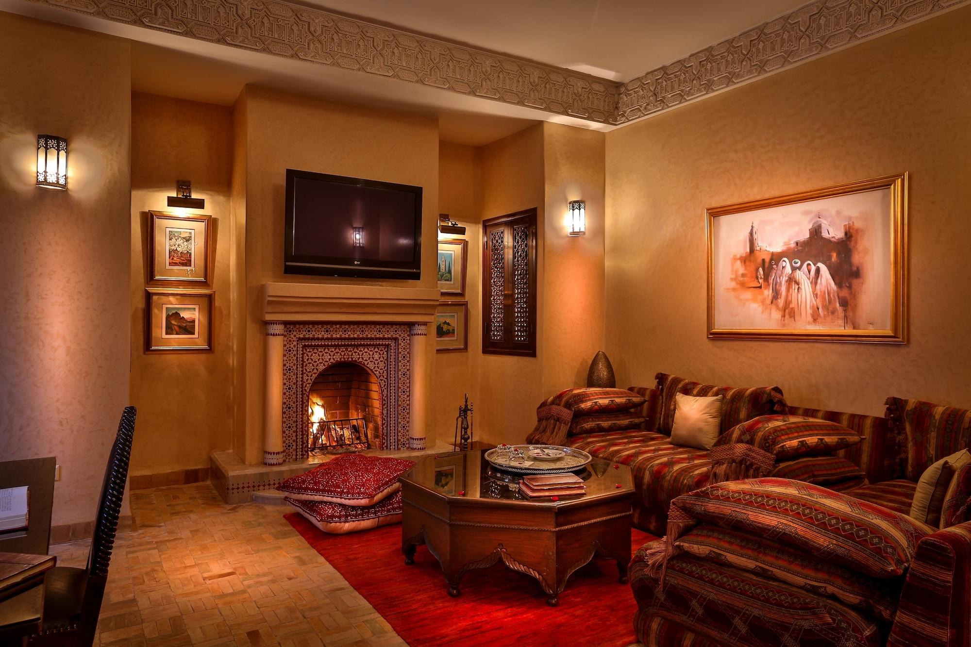 Riad Kniza Марракеш Экстерьер фото A living room in a Moroccan hotel