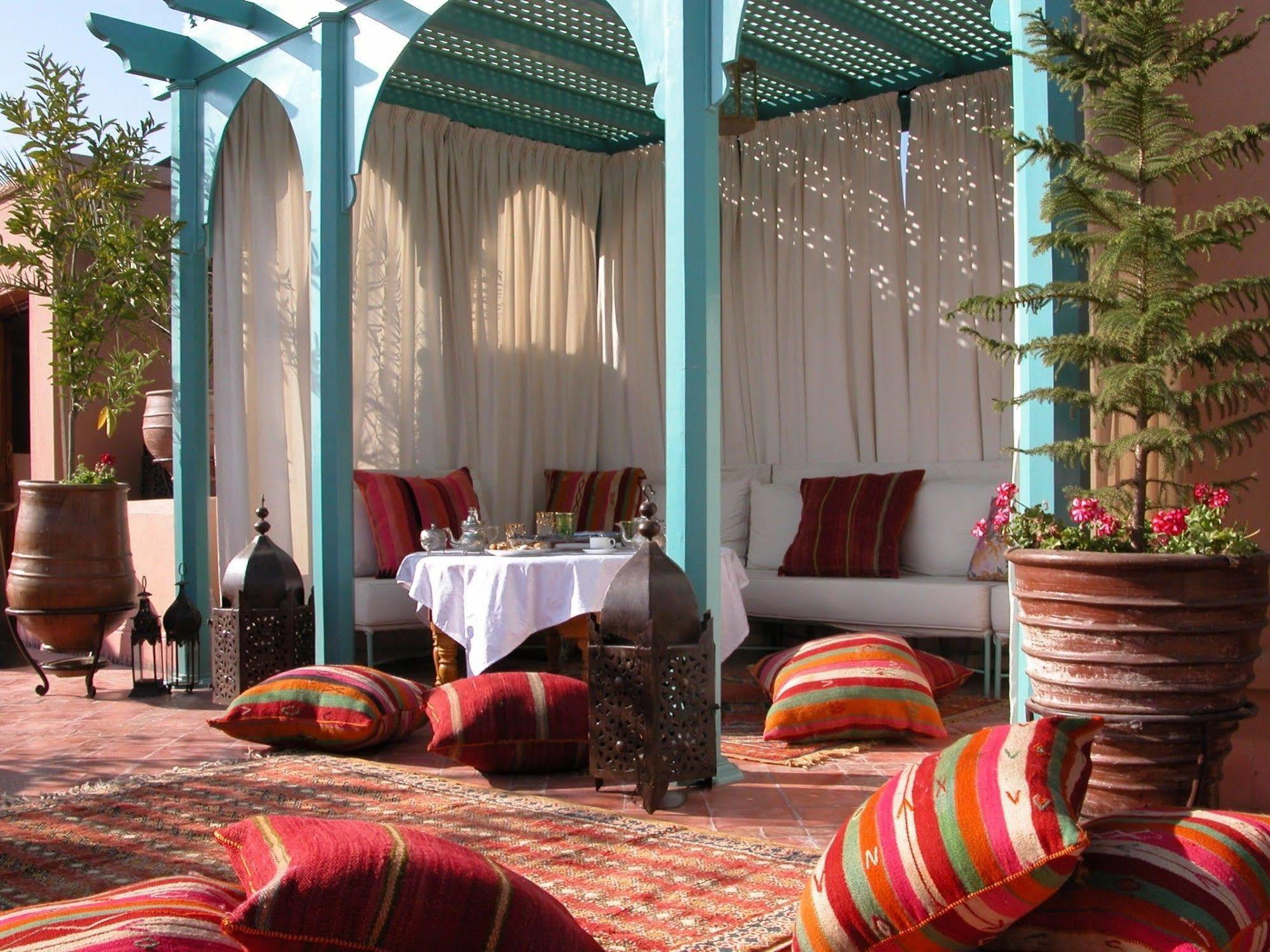 Riad Kniza Марракеш Экстерьер фото Roof terrace at the Hotel Amanjena